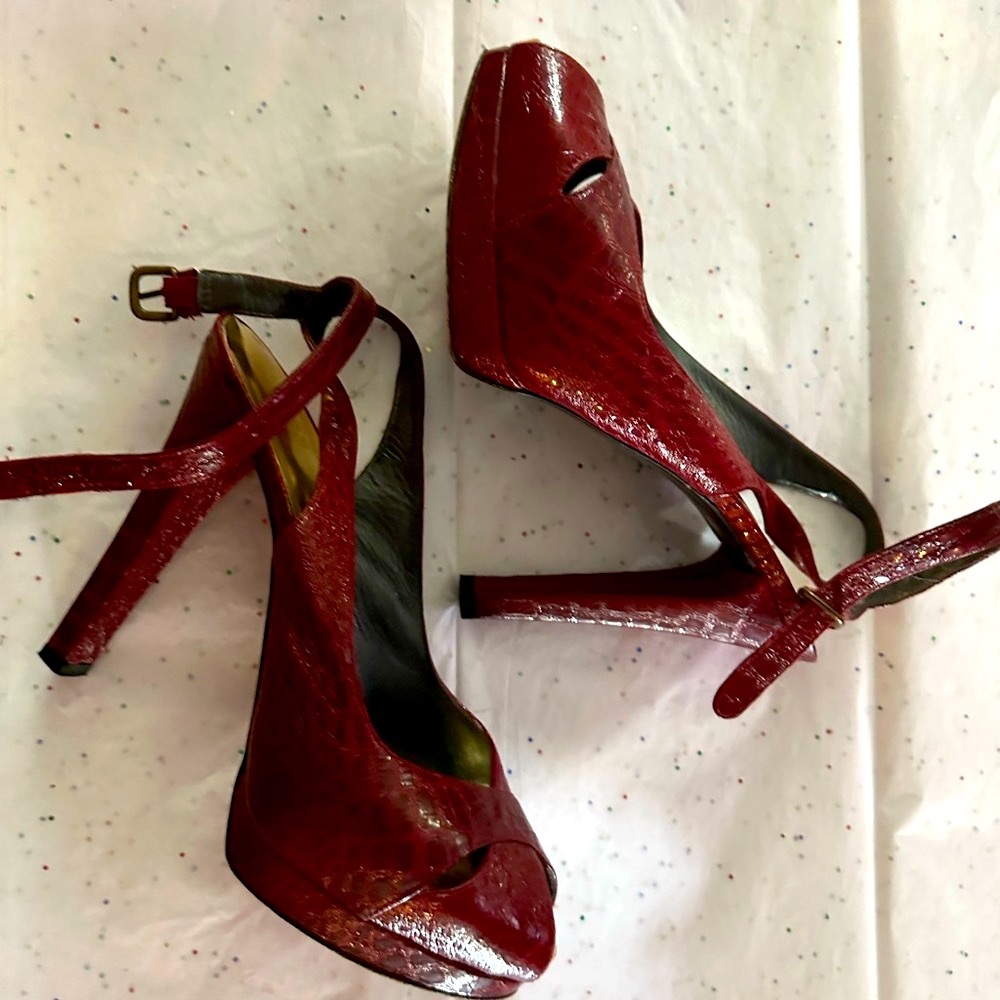 Stuart Weisman, red ankle strap heal
